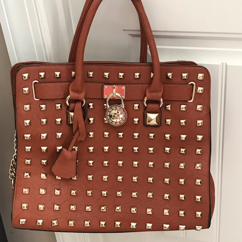 Brown studded leather purse